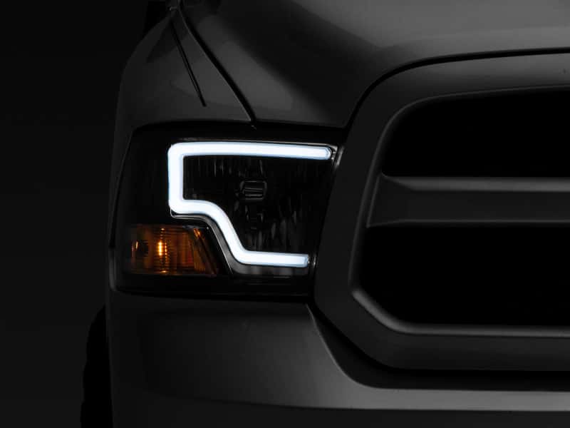 Raxiom — Raxiom 09-18 Dodge RAM 1500 LED Bar Headlights- Black Housing (Clear Lens)
Headlights - view 2