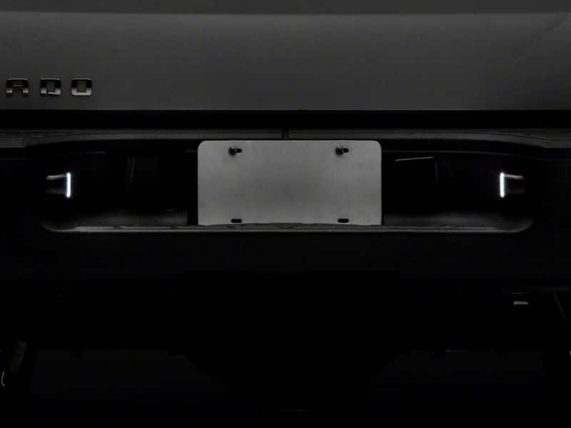 Raxiom — Raxiom 01-13 Chevrolet Silverado/GMC Sierra 1500 Axial Series LED License Plate Lamps- Smoked
Bulbs - view 4