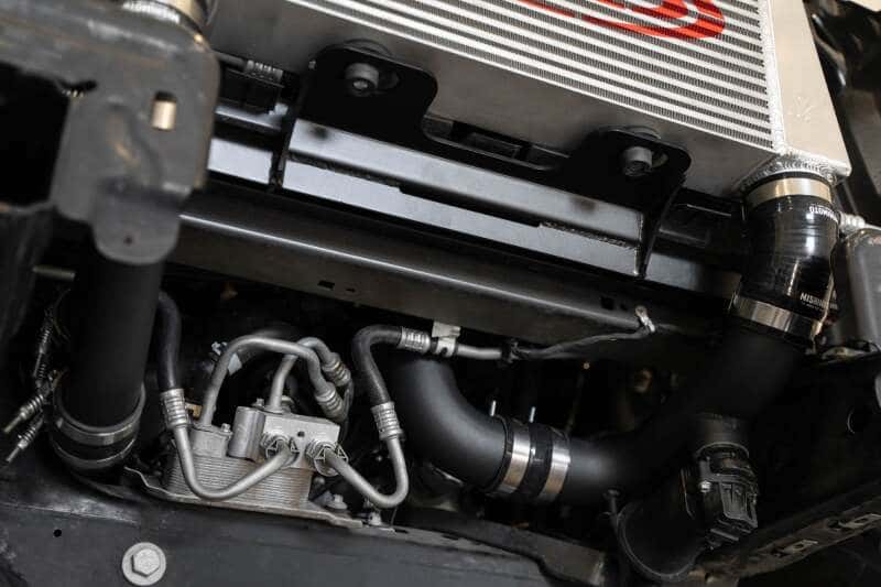 Addictive Desert Designs — Addictive Desert Designs 17-18 Ford F-150 Raptor aFe Intercooler Upgrade Kit
TChrgrIcoolerMount - view 9