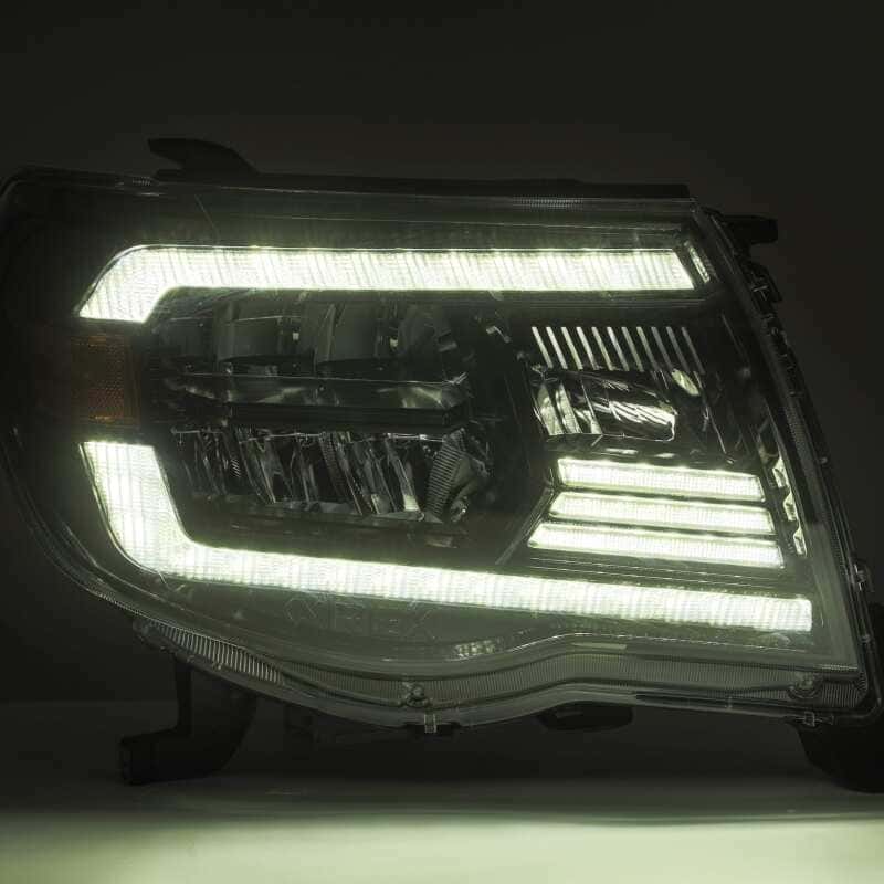 AlphaRex — AlphaRex 05-11 Toyota Tacoma LUXX Crystal Headlights Plank Style Alpha Black w/Activation Light/DRL
Projector Headlights - view 4