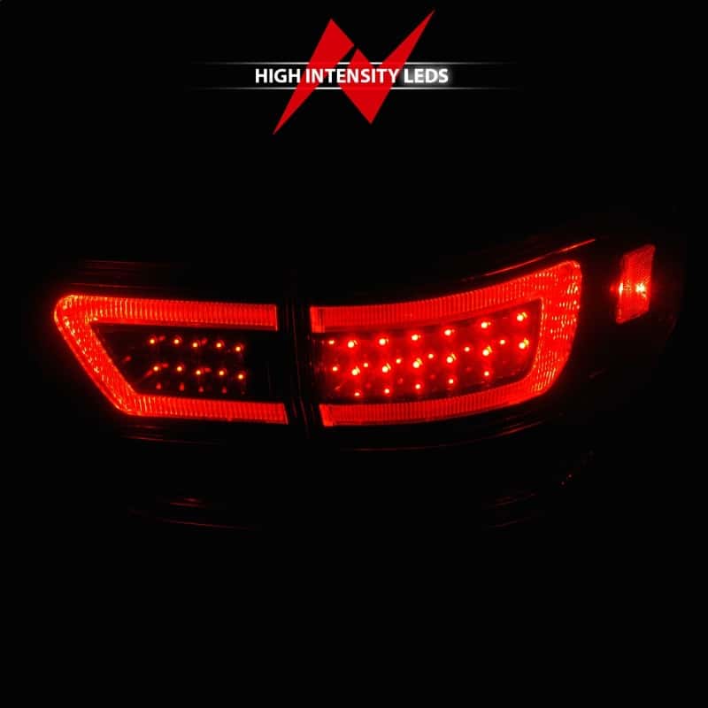 ANZO — ANZO 11-13 Jeep Grand Cherokee LED Taillights w/ Lightbar Black Housing/Clear Lens 4pcs - view 7
