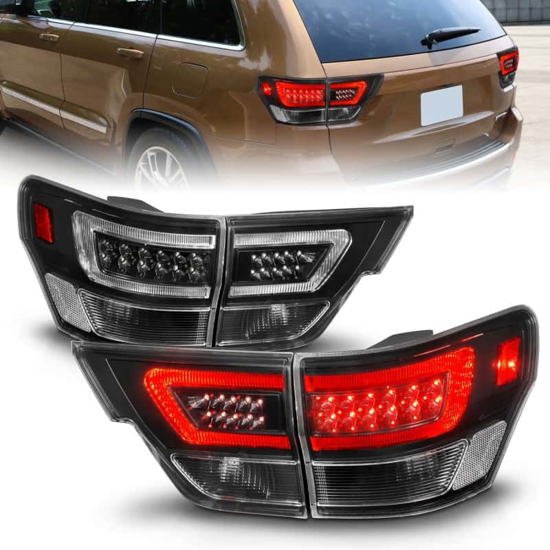 ANZO — ANZO 11-13 Jeep Grand Cherokee LED Taillights w/ Lightbar Black Housing/Clear Lens 4pcs - view 1