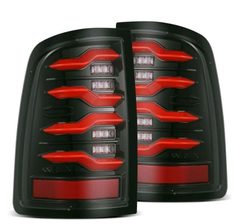 AlphaRex — AlphaRex 09-18 Dodge RAM LUXX-Series LED Taillights Black Red w/Actv Light & SS
Taillight Assembly - view 1