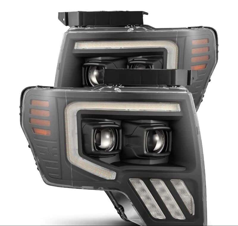 AlphaRex — AlphaRex 09-14 Ford F-150 PRO-Series Projector Headlights Plank Style Black w/Activ Light/Seq Signal
Projector Headlights - view 1