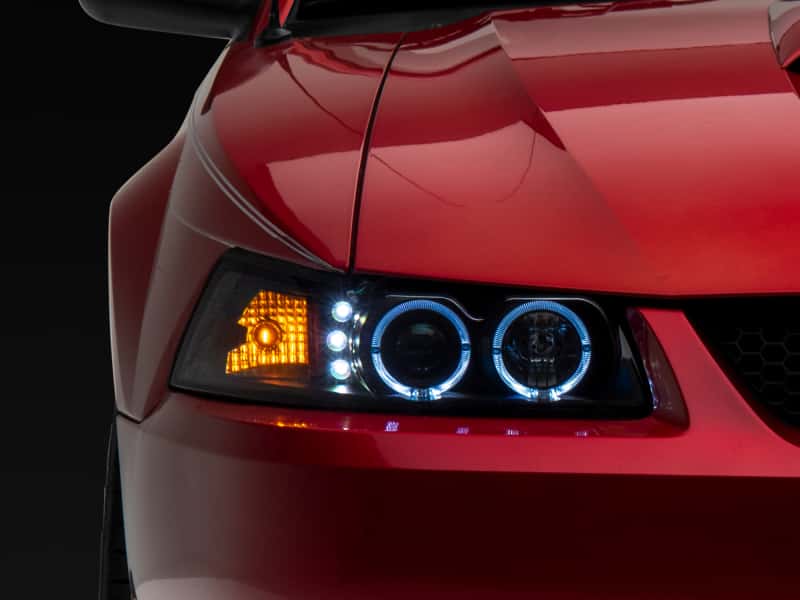 Raxiom — Raxiom 99-04 Ford Mustang Dual LED Halo Projector Headlights- Black Housing (Clear Lens)
Headlights - view 3