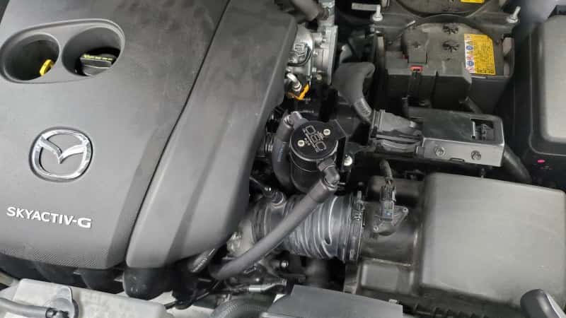J&L — J&L 14-24 Mazda CX5 2.5L Non-turbo Driver Side 3.0 Oil Separator Kit - Black Anodized
Oil Separator - view 2