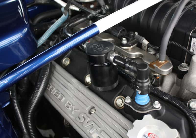J&L — J&L 07-14 Ford Mustang GT500 Passenger Side Oil Separator 3.0 - Black Anodized
Oil Separator - view 1