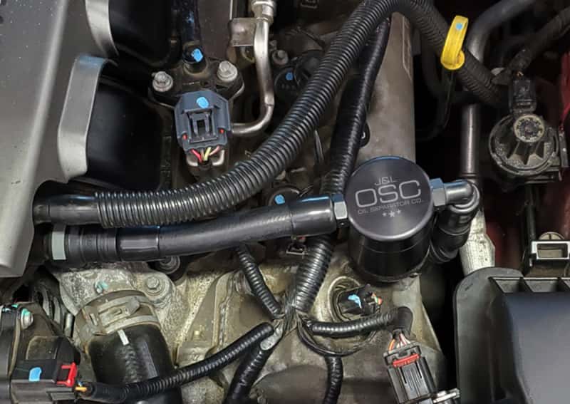 J&L — J&L 05-10 Ford Mustang GT Driver Side Oil Separator 3.0 V2 - Black Anodized
Oil Separator - view 2