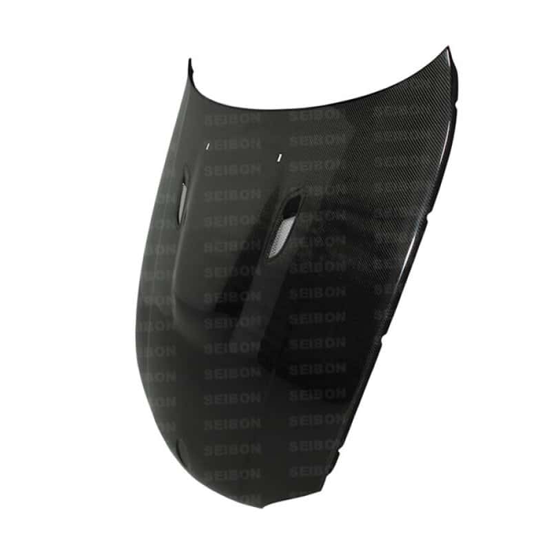 Seibon — Seibon 08-11 BMW 1 Series (E81/E82) 2DR/HB BM Carbon Fiber Hood - view 3