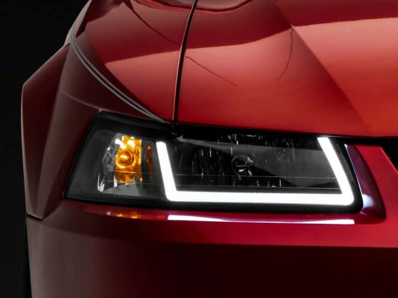 Raxiom — Raxiom 99-04 Ford Mustang Axial Series Headlights w/ LED Bar- Blk Housing (Clear Lens)
Headlights - view 7