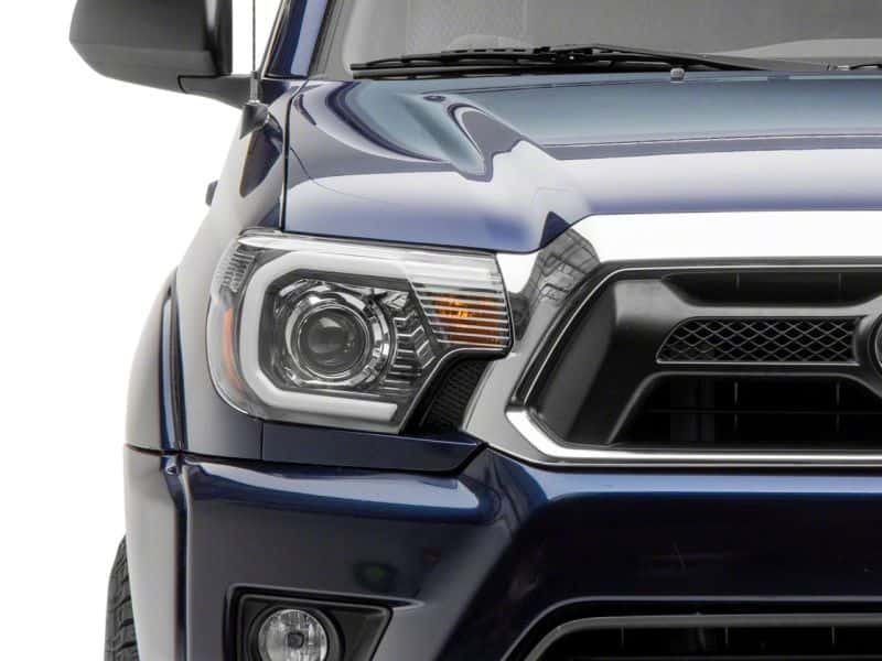 Raxiom — Raxiom 12-15 Toyota Tacoma Axial Projector Headlights w/ SEQL LED Bar- Blk Housing (Clear Lens)
Headlights - view 10