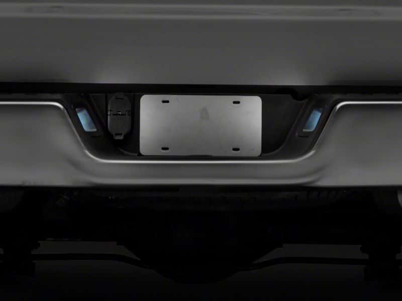 Raxiom — Raxiom 13-18 Dodge RAM 1500 Axial Series LED License Plate Lamps- Smoked
Bulbs - view 4