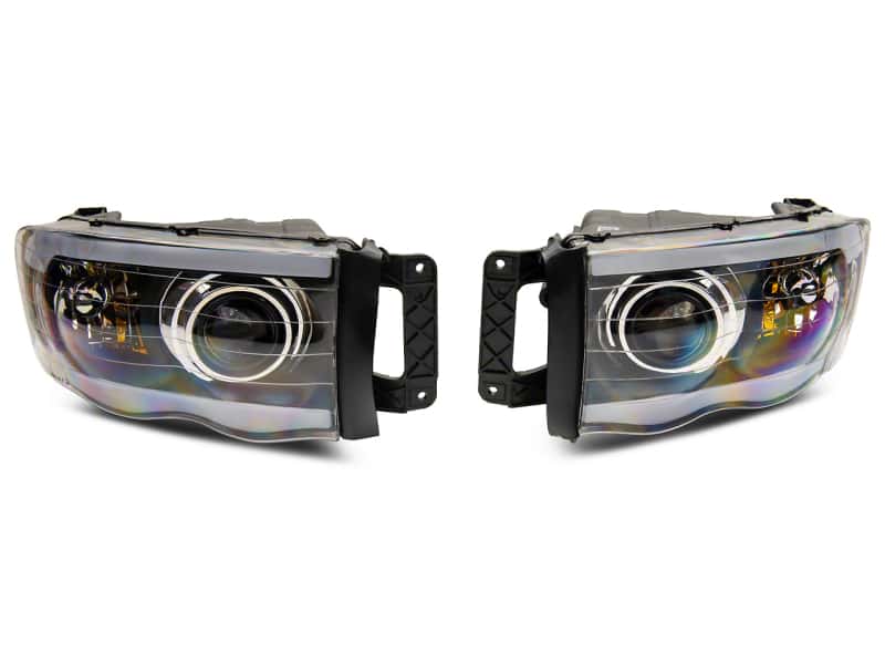 Raxiom — Raxiom 02-05 Dodge RAM 1500 LED Projector Headlights w/ SEQL LED Bar- Blk Housing (Clear Lens)
Headlights - view 1