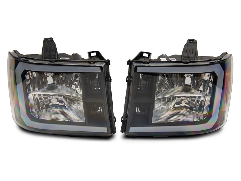 Raxiom — Raxiom 07-13 GMC Sierra 1500 Axial Series Headlights w/ LED Bar- Blk Housing (Clear Lens)
Headlights