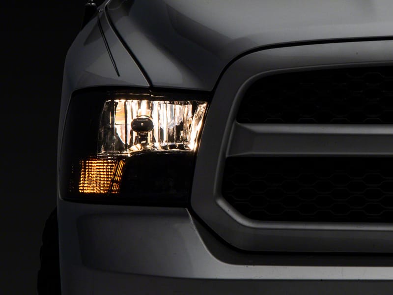 Raxiom — Raxiom 09-18 Dodge RAM 1500 Axial OEM Rep Headlights w/ Dual Bulb- Chrome Housing (Smoked Lens )
Headlights