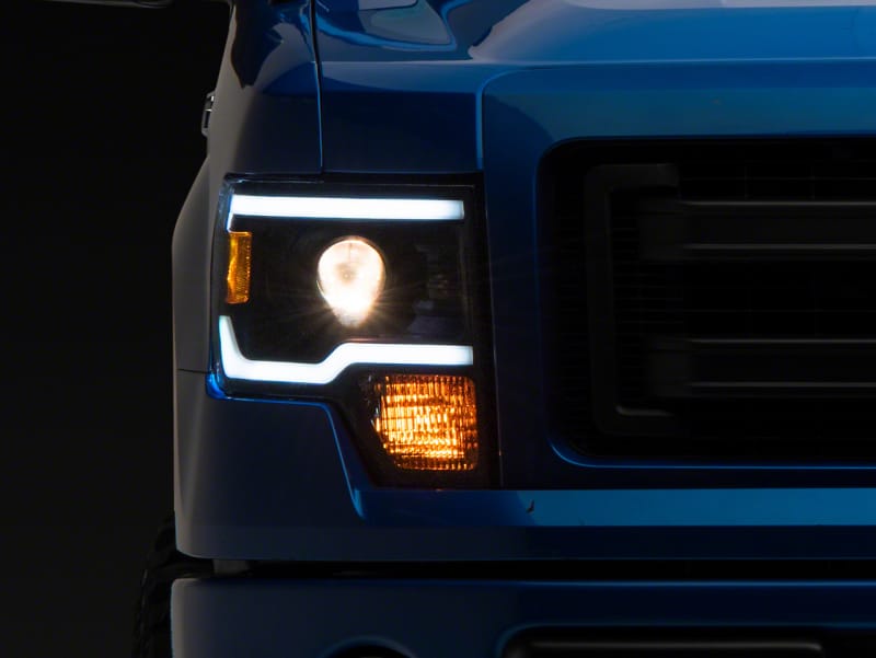Raxiom — Raxiom 09-14 Ford F-150 Axial Series Projector Headlights w/ LED Light Bar- Blk Housing (Clear Lens)
Headlights