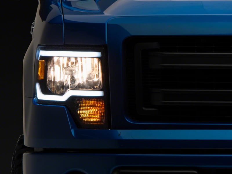 Raxiom — Raxiom 09-14 Ford F-150 Axial Series Headlights w/ LED Bar- Blk Housing (Clear Lens)
Headlights