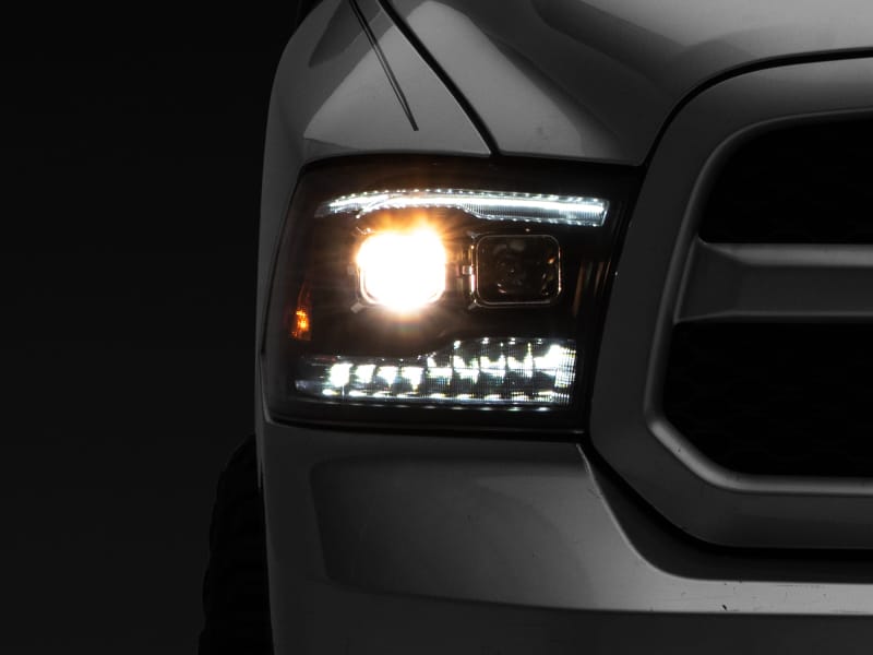 Raxiom — LED Projector Headlights with Switchback Turn Signals
Black Housing
Clear Lens