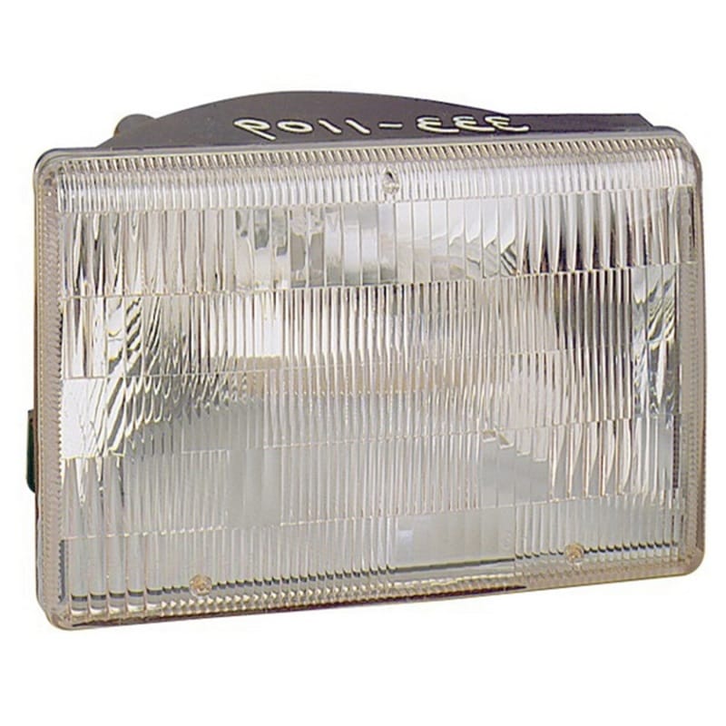 OMIX — Omix Left Headlight 93-98 Jeep Grand Cherokee (ZJ)