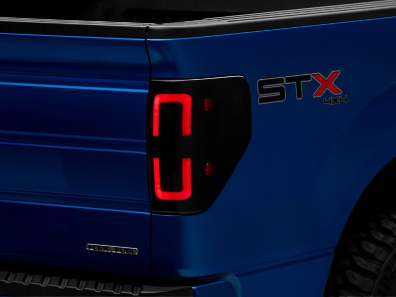 Raxiom — Raxiom 09-14 Ford F-150 Styleside Axial Series LED Tail Lights w/ Halo- Blk Housing (Smoked Lens)
Lights