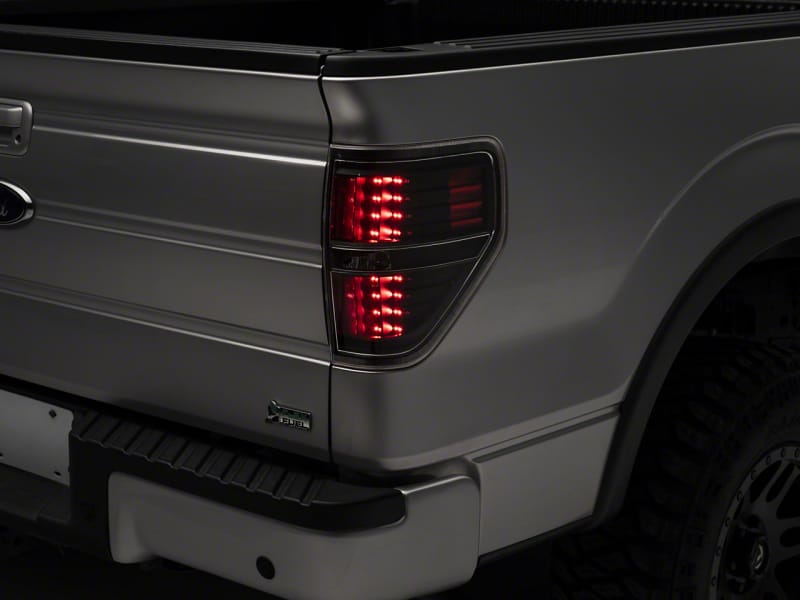 Raxiom — Raxiom 09-14 Ford F-150 Styleside LED Tail Lights- Blk Housing (Clear Lens)
Lights