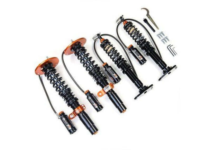 AST — 2-WAY adjustable coilovers in rebound and compression, incl canisters.