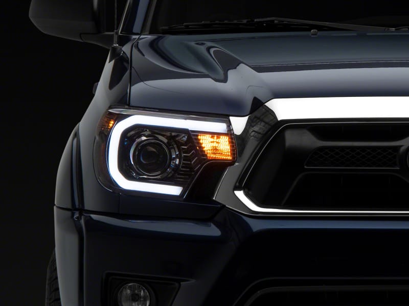 Raxiom — Raxiom 12-15 Toyota Tacoma Axial Projector Headlights w/ SEQL LED Bar- Blk Housing (Clear Lens)
Headlights
