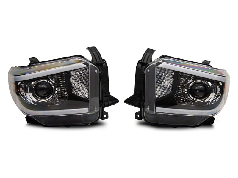 Raxiom — Axial Series Projector Headlights with LED Bar
Black Housing
Clear Lens