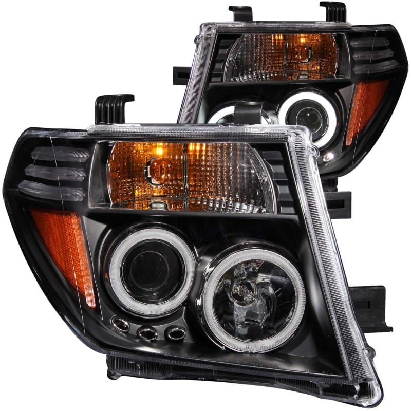 ANZO — ANZO 2005-2008 Nissan Frontier Projector Headlights w/ Halo Black
Head Light Set
HdLtSet