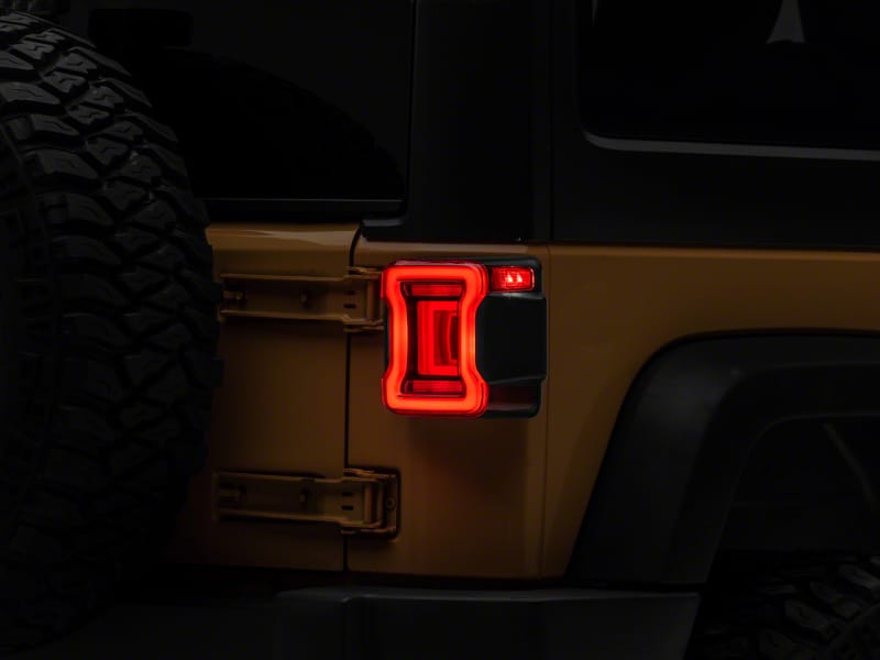 Raxiom — Raxiom 07-18 Jeep Wrangler JK Axial Series JL Style LED Tail Lights- BlkHousing- Red Lens
Lights