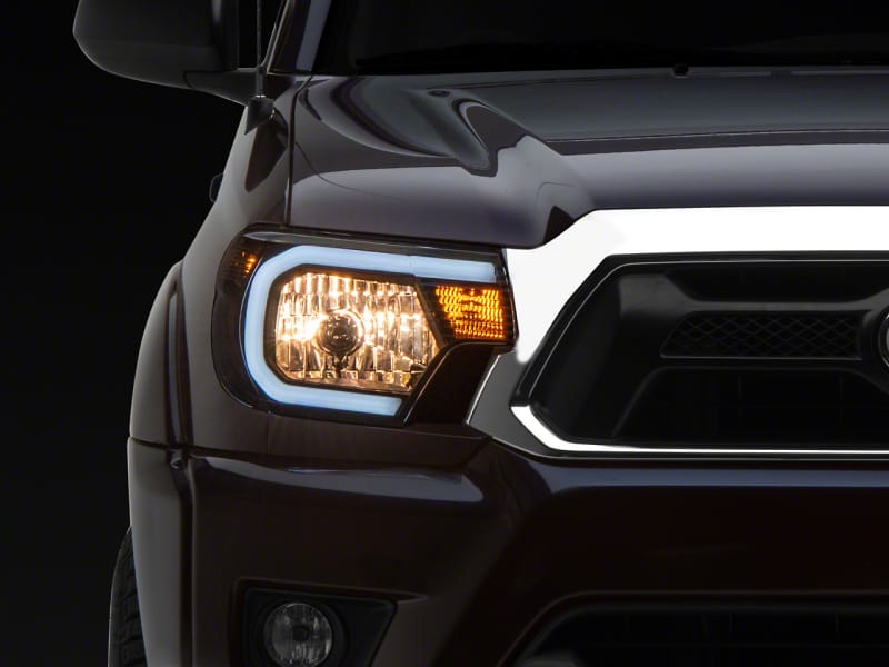 Raxiom — Raxiom 12-15 Toyota Tacoma Axial Series Headlights w/ LED Bar- Blk Housing (Clear Lens)
Headlights