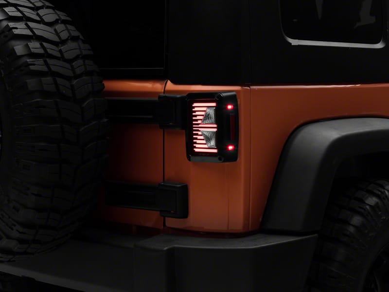 Raxiom — Raxiom 07-18 Jeep Wrangler JK Axial Series Vision LED Tail Lights- Blk Housing (Clear Lens)
Lights
