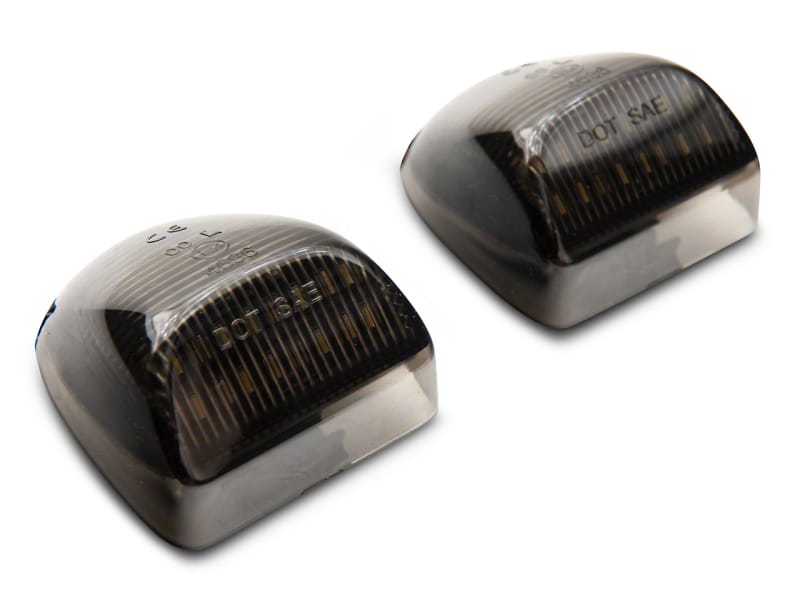 Raxiom — Raxiom 01-13 Chevrolet Silverado/GMC Sierra 1500 Axial Series LED License Plate Lamps- Smoked
Bulbs