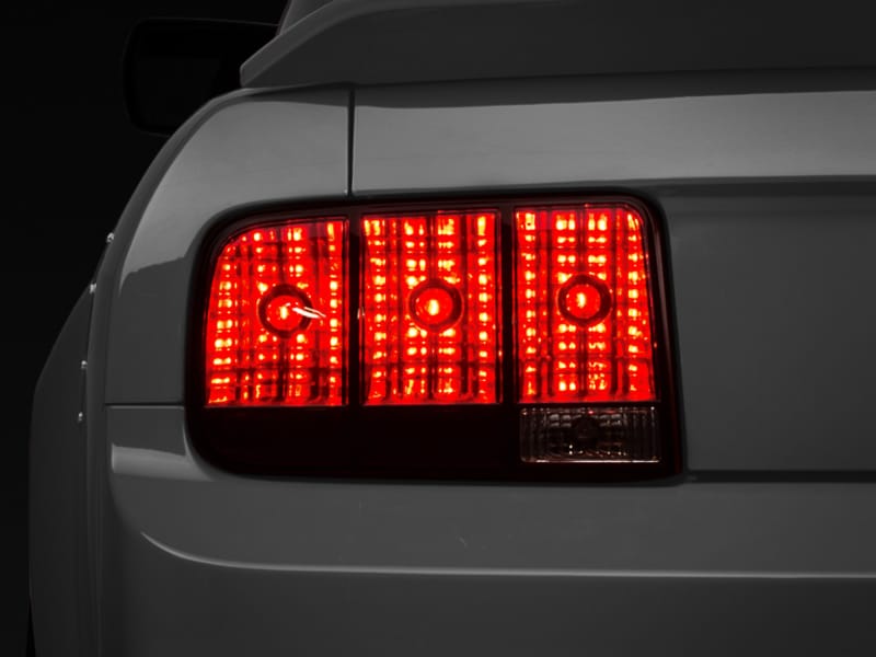 Raxiom — Raxiom 05-09 Ford Mustang Tail Lights- Black Housing (Smoked Lens)
Lights