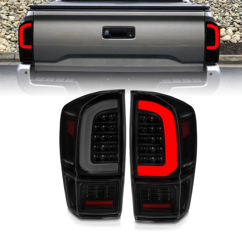 ANZO — ANZO 16-21 Toyota Tacoma LED Tail Lights - w/ Light Bar Sequential Black Housing & Smoke Lens
Tail Light Set