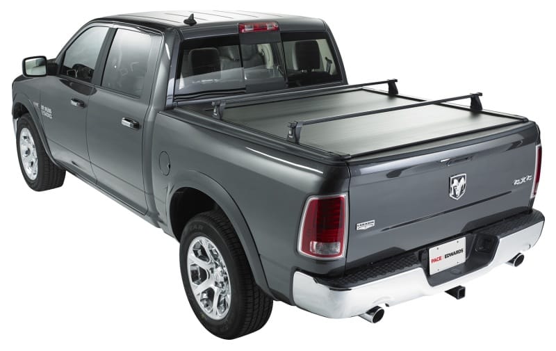 Pace Edwards — Pace Edwards 04-15 Nissan Titan King Cab 6ft 7in Small Bed UltraGroove Electric
Tonneau Cover