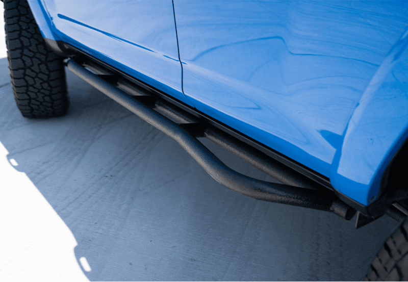 Cali Raised LED — Cali Raised 10-24 Toyota 4Runner Trail Edition Bolt On Rock Sliders - Kick Out / BedLiner