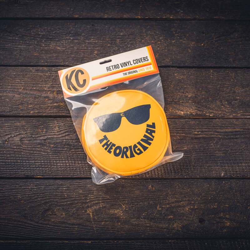 KC HiLiTES — KC HiLiTES Retro 6in Round Yellow Vinyl Light Cover w/ Black KC Sunglasses Logo